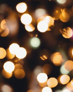 A captivating abstract image featuring bokeh lights with warm and soft tones ideal for backgrounds.